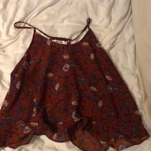 Burnt red tank top with floral pattern